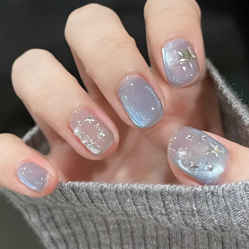 Künstlerisches Press-On Nagelset mit himmlischem Thema Karnz