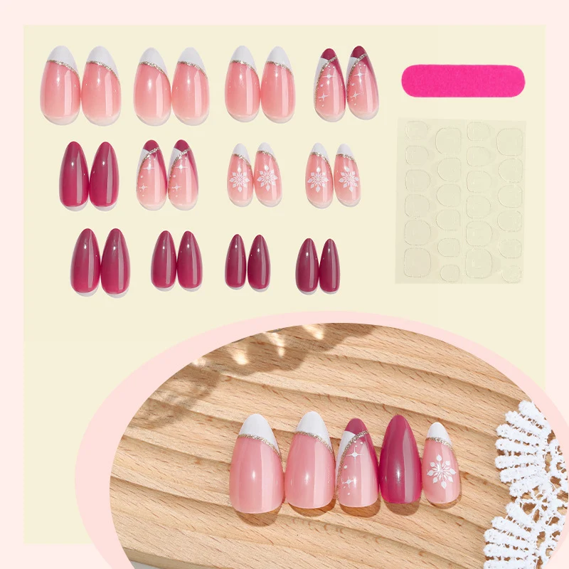 Kunstnagelset mit dekorativen Blütenmotiven und elegantem Ombre-Effekt Karnz