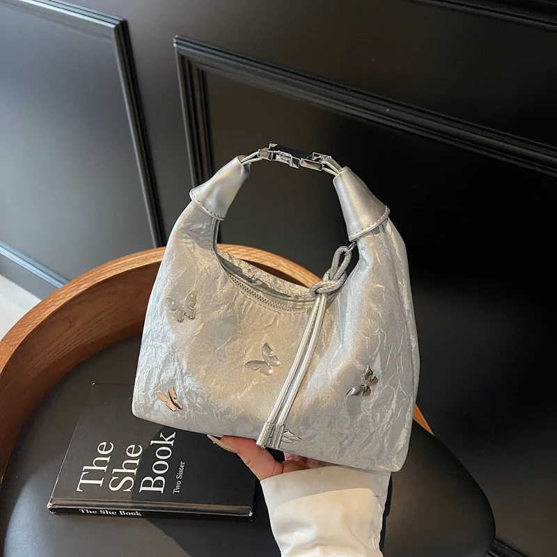 Stylische Handtasche mit Schmetterlingsdetail Karnz