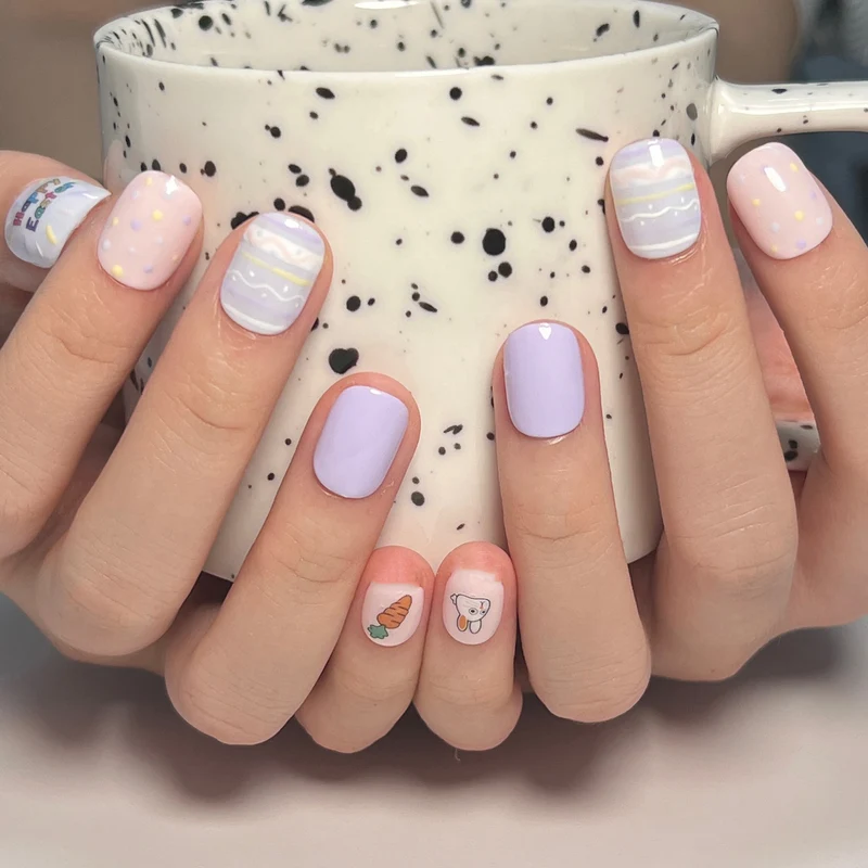 Kunstvolle Nagelkunst mit süßen Tiermotiven und pastellfarbenem Design Karnz