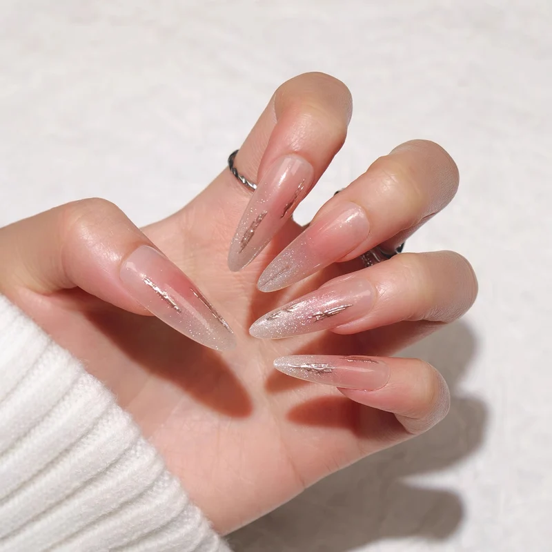 Elegante Stiletto Press-On Nägel mit Glitzerakzenten Karnz 1789085706