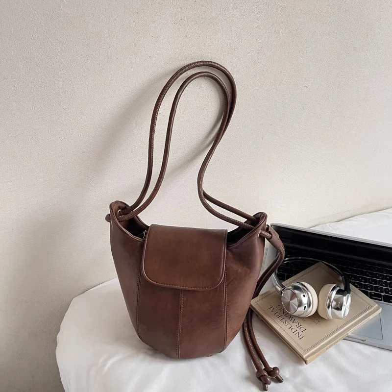 Vintage-inspirierte Leder Kordelzug Eimer Tasche Karnz