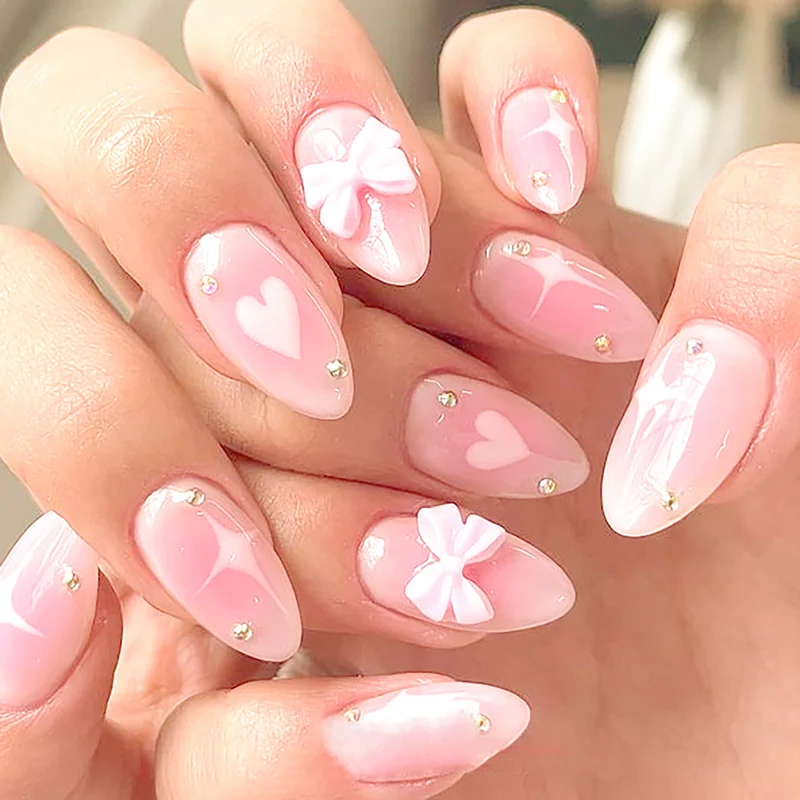 Dekorative Stiletto Press-On Nägel mit Schleifenakzent Karnz