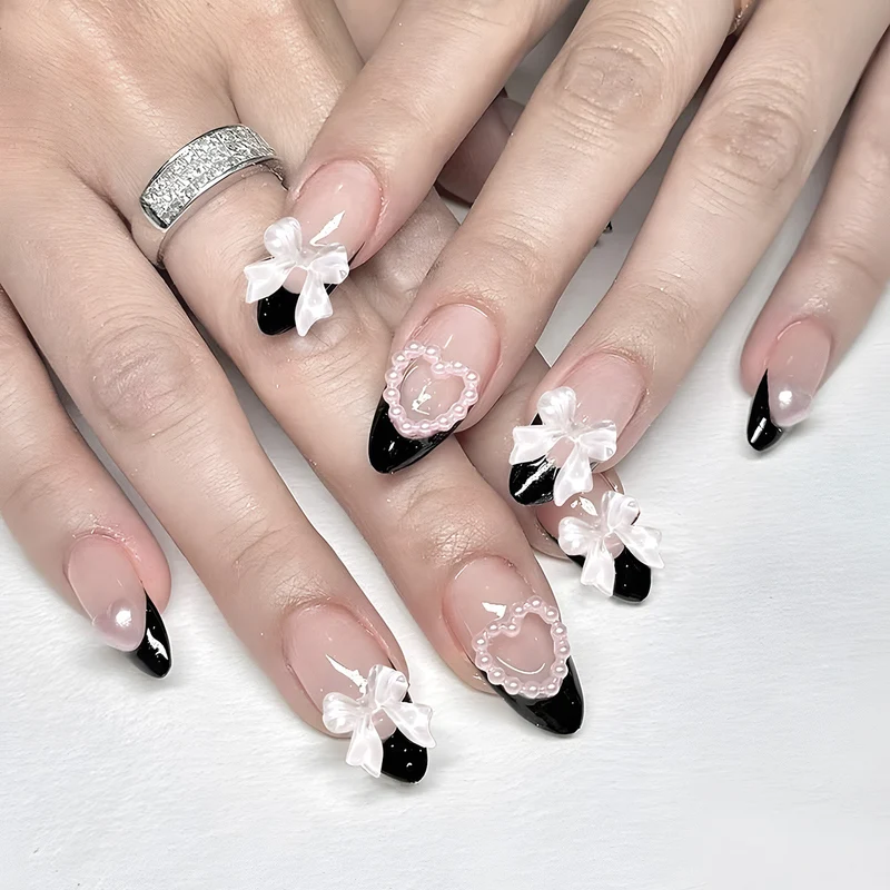 Dekorative schwarze und Perlenakzent Stiletto Press-On Nägel Karnz