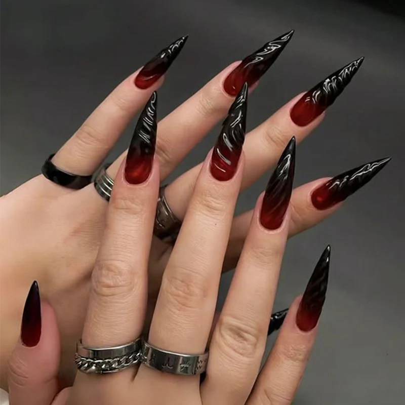 Künstlerische Stiletto Press-On Nägel mit dramatischem Ombre-Effekt Karnz