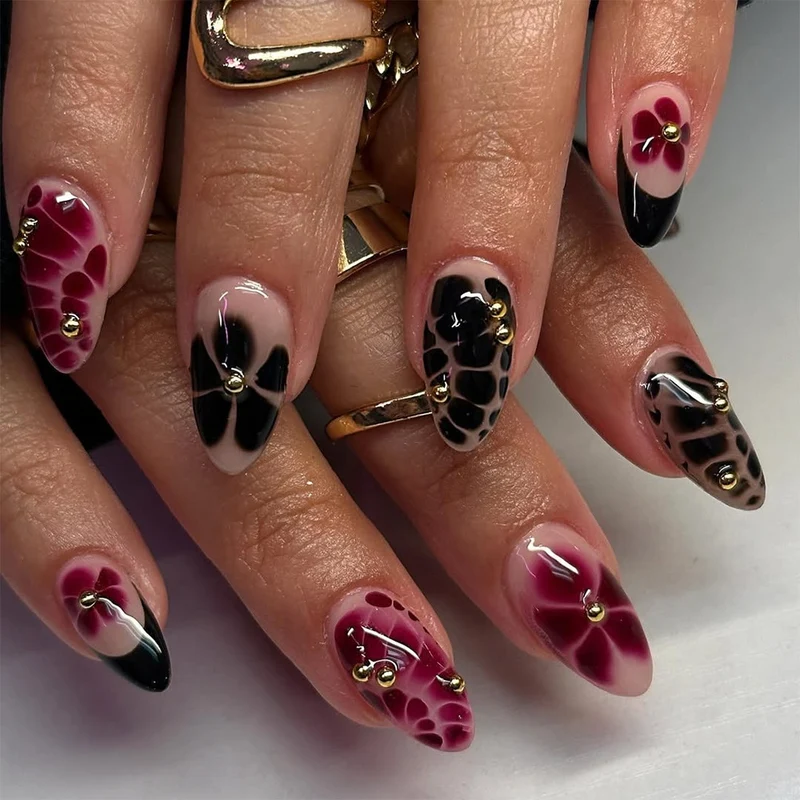 Kunstvolle Nagelkunst mit elegantem Schmuckdesign Karnz