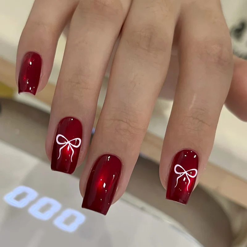 Glänzendes Schleifenakzent-Nagelkunstset Karnz