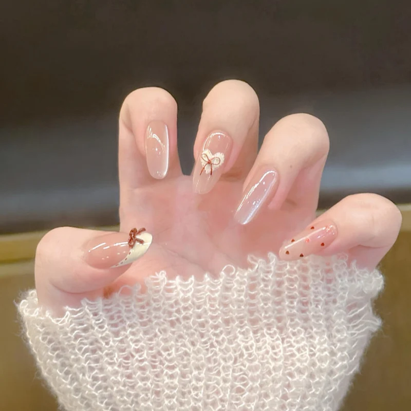 Dekorative Nagelkunst Tipps mit Schleifenakzenten Karnz