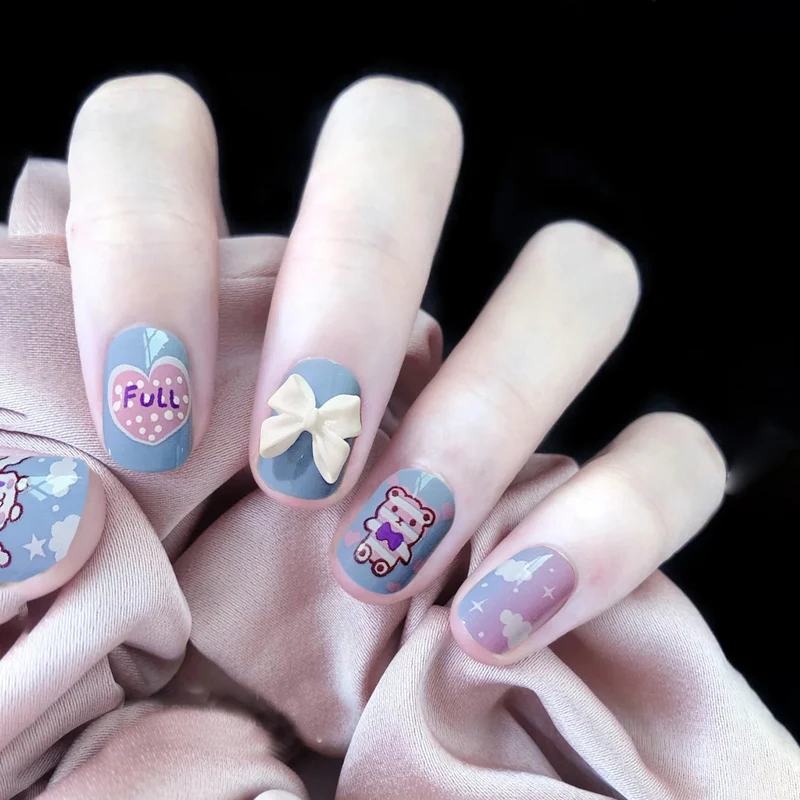 Kreative Nagelkunst mit Bogen- und Tiermotiven Karnz