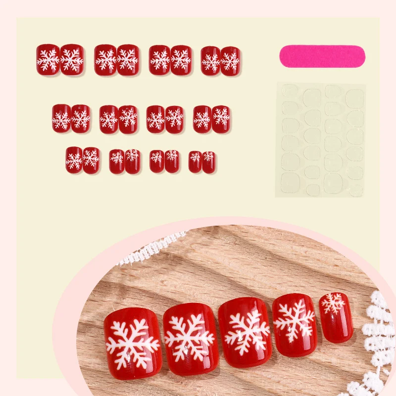 Kunstnagelset mit winterlichen Schneeflockenmotiven Karnz