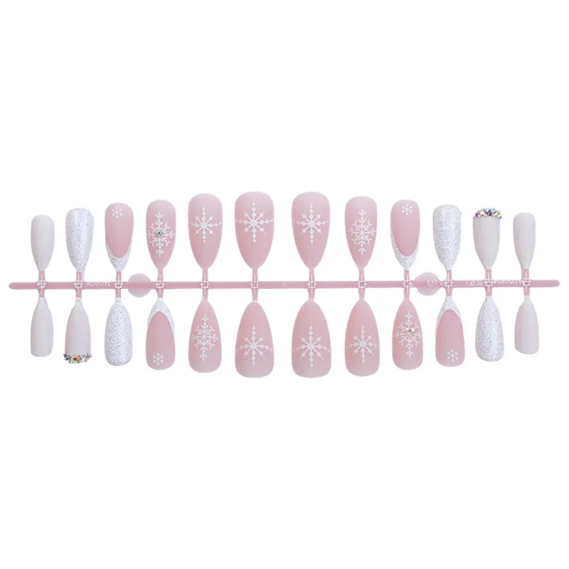 Kunstnagelset mit winterlichen Schneeflocken-Design Karnz
