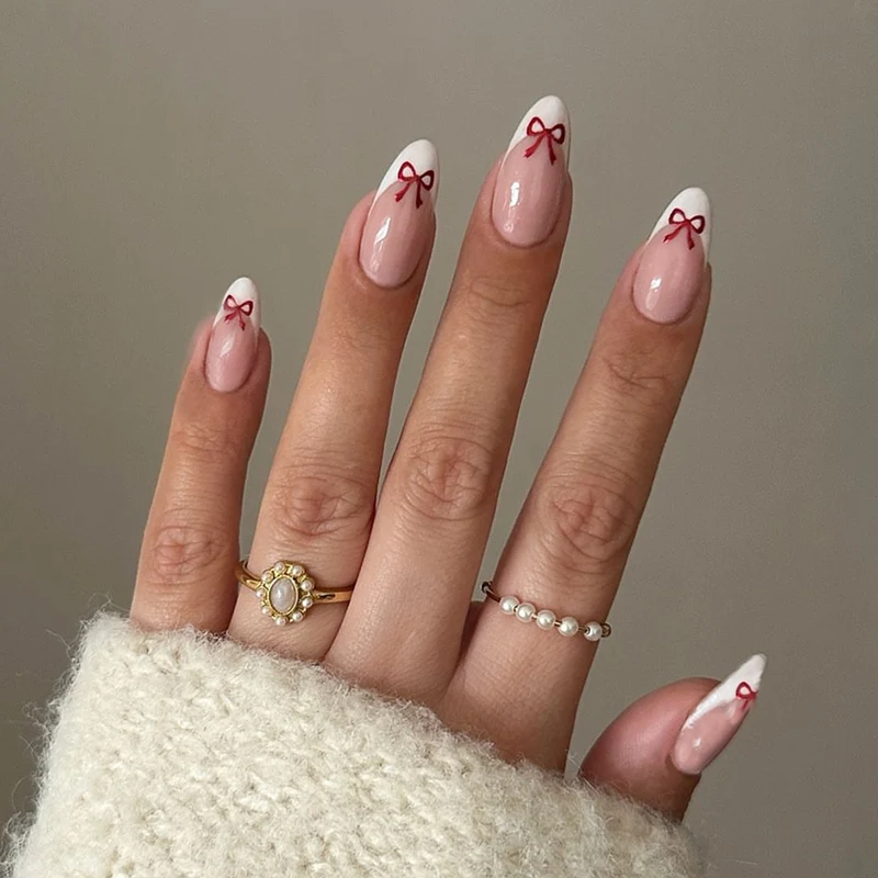 Kunstnagelset mit verspieltem Schleifen-Design Karnz