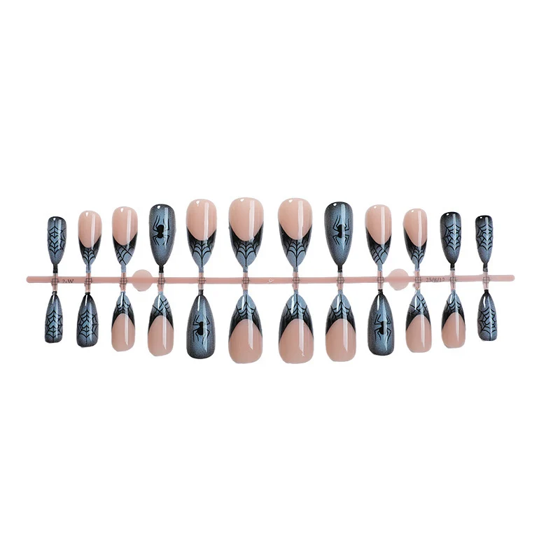 Kunstnagelset mit stilvollem Spinnenmotiv Karnz