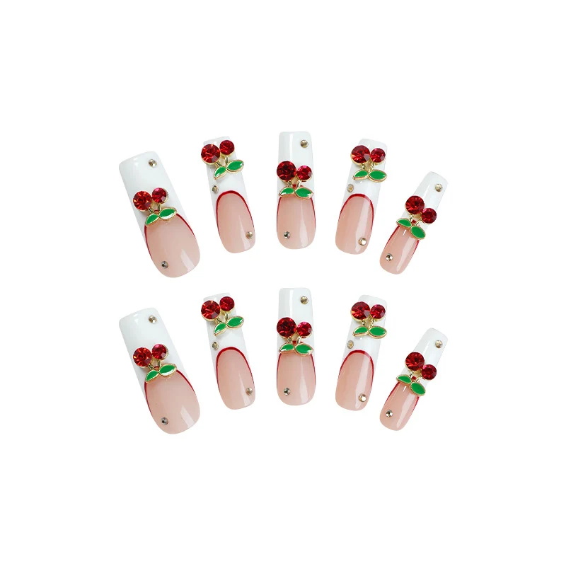 Kunstnagelset mit Kirschmotiv und funkelnden Strasssteinen Karnz