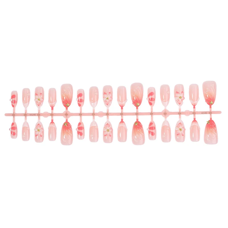Kunstnagelset mit floralem Design und zartem Farbverlauf Karnz