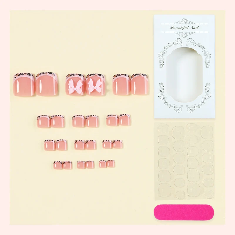 Kunstnagelset mit eleganten Schleifen und luxuriösen Designs Karnz