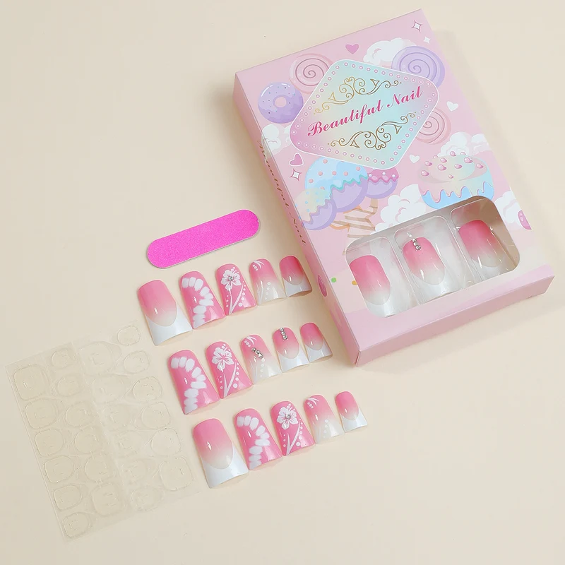 Kunstnagelset mit eleganten Floral-Designs und Glitzerakzenten Karnz