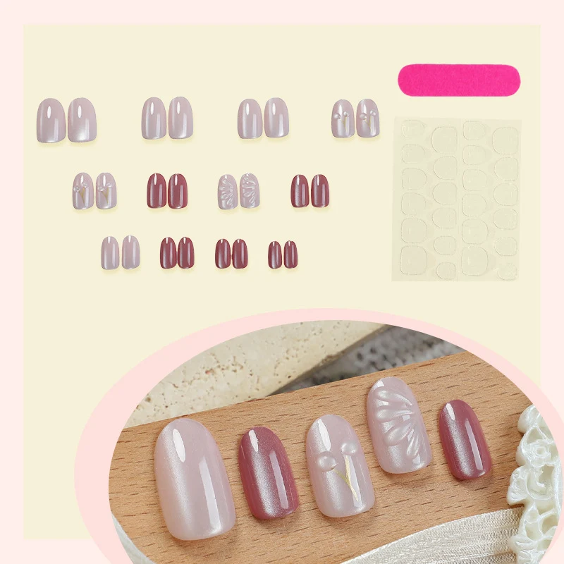 Kunstnagelset mit elegantem Hochglanz-Finish und kreativen Verzierungen Karnz