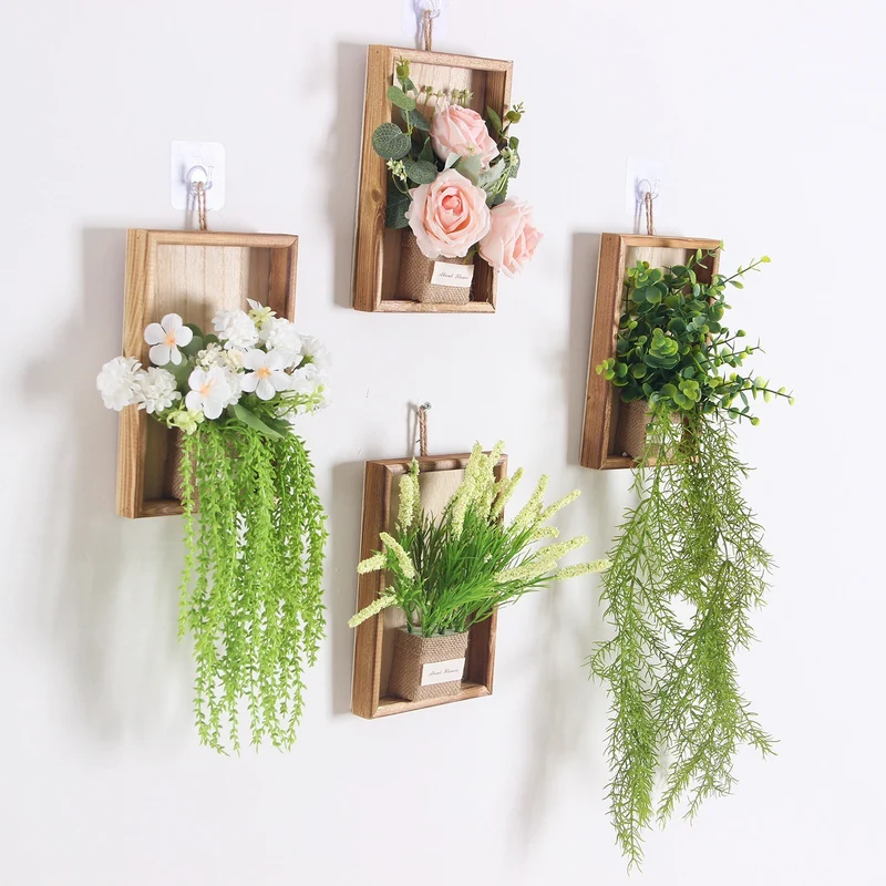 Wandmontierte dekorative florale hängende Pflanzgefäß